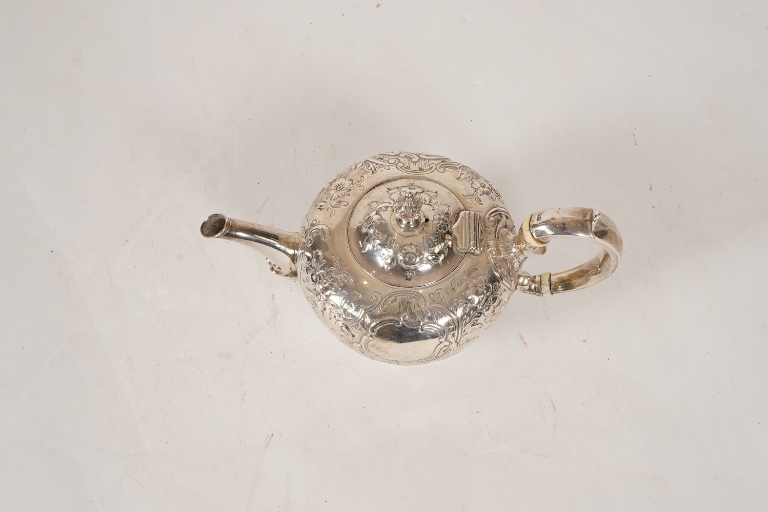 A George II provincial silver bachelor's tea pot, by Micon Melvn?